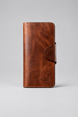 Portefeuille Long Cuir Cognac à Rabat – sur tabouret